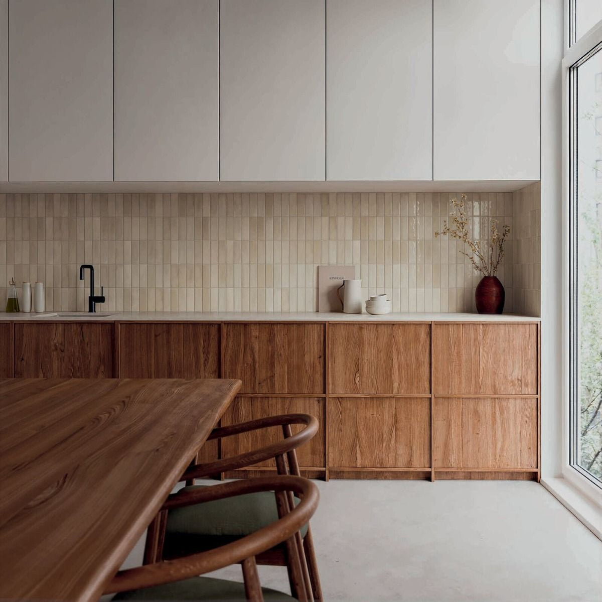 A single Calema 2x6 Greige Gloss ceramic wall tile displayed on a white background, emphasizing its greige tone and smooth gloss.
