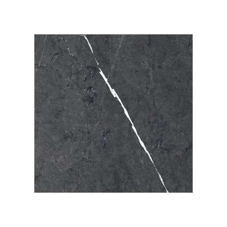 A sample of the Classica Nero Marquina tile next to other tiles from the Classica collection, illustrating colour options.