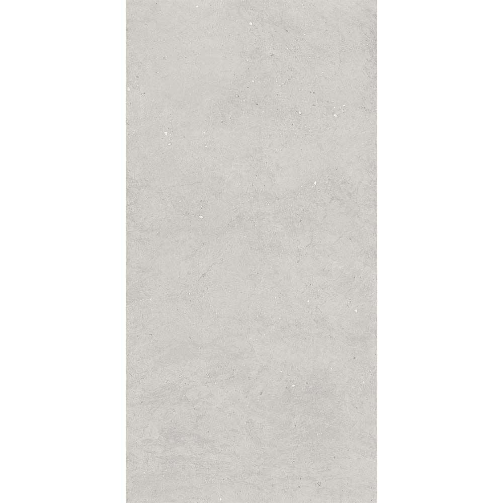A bathroom wall tiled with Canve Argile 12x24 Glazed Porcelain Tiles, highlighting the rectified edges and seamless look.