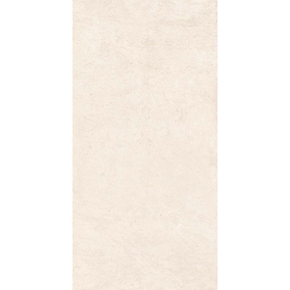 A stack of Canve Craie 12x24 inch glazed porcelain tiles, highlighting the rectified edges and consistent colour.