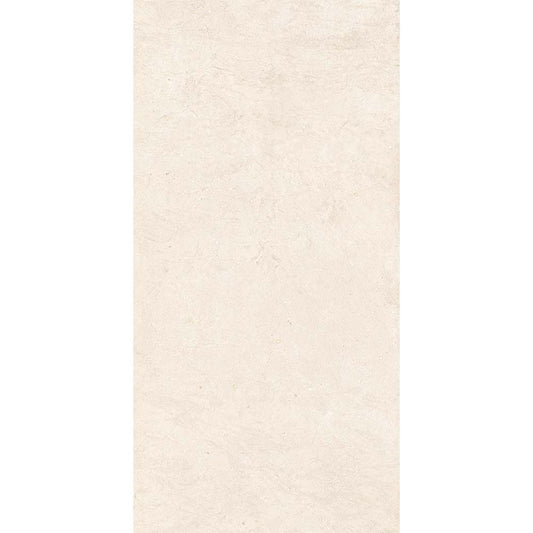 A stack of Canve Craie 12x24 inch glazed porcelain tiles, highlighting the rectified edges and consistent colour.
