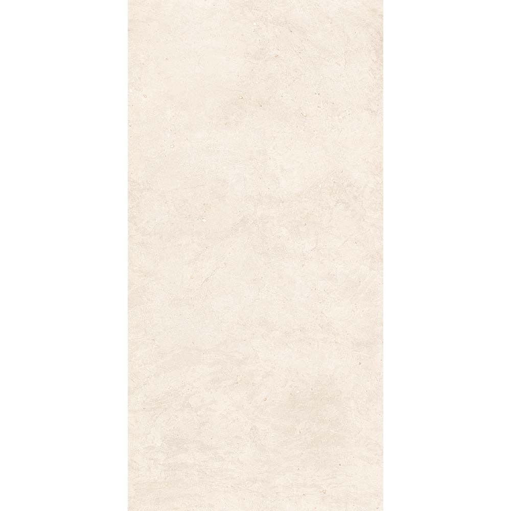Room scene featuring Canve Craie 12x24 inch glazed porcelain tiles installed on a floor, showcasing the moderate variation.
