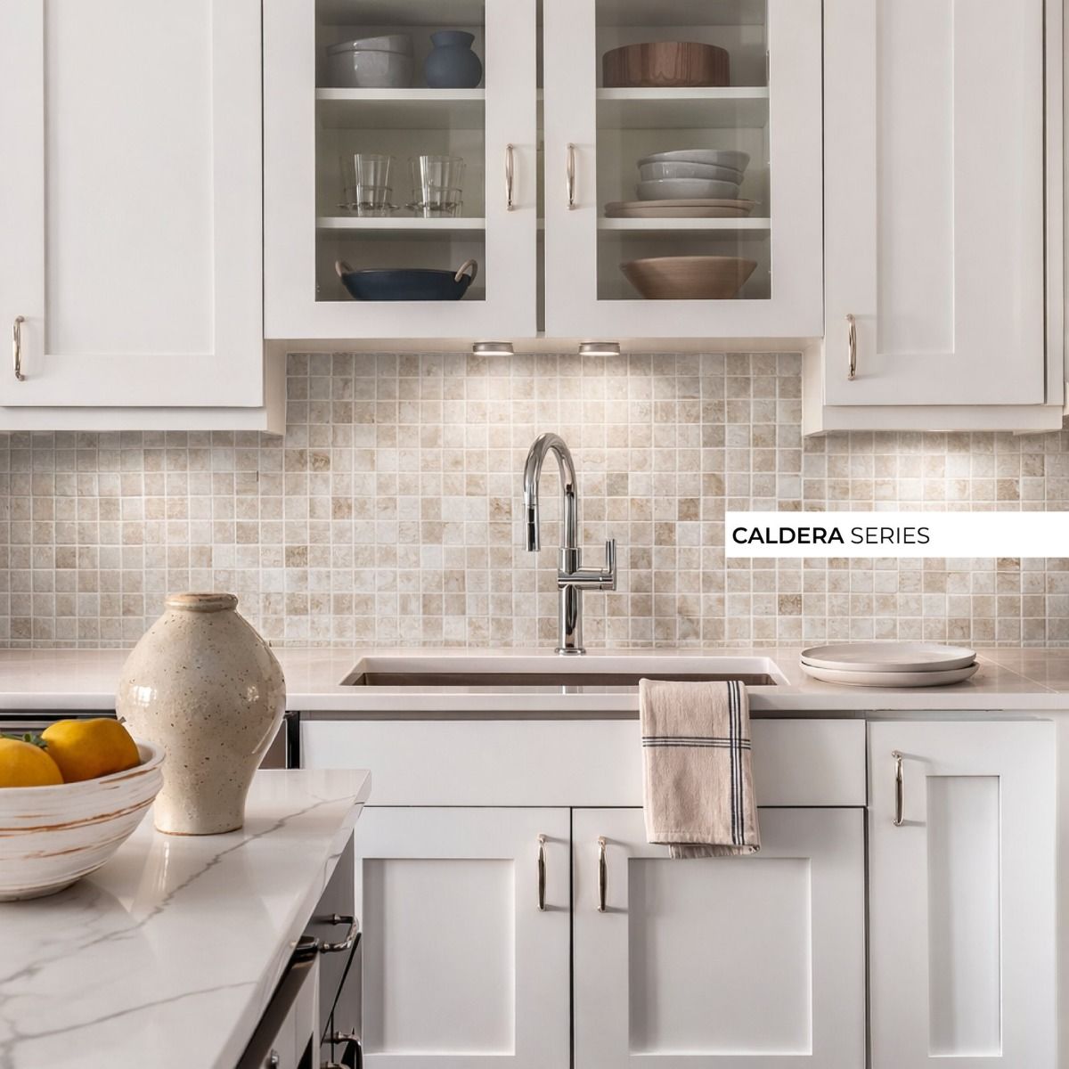 Close-up of the Ames Tile Caldera Sumatra Vanguard glass mosaic showing the matte finish and varied faces of the 2" tiles.