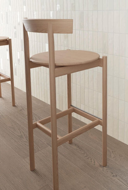 Arrangement of several Calema 2x6 White Matte Glazed Ceramic Wall Tiles, highlighting the substantial variation in tone.