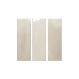 Close-up view of a stack of Calema 2x6 Greige Gloss ceramic wall tiles, showing their rectangular shape and glossy finish.