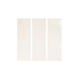 Close-up view of Ames Tile Calema 2x6 White Gloss ceramic wall tiles arranged in a pattern, showing their reflective surface and slight variations.