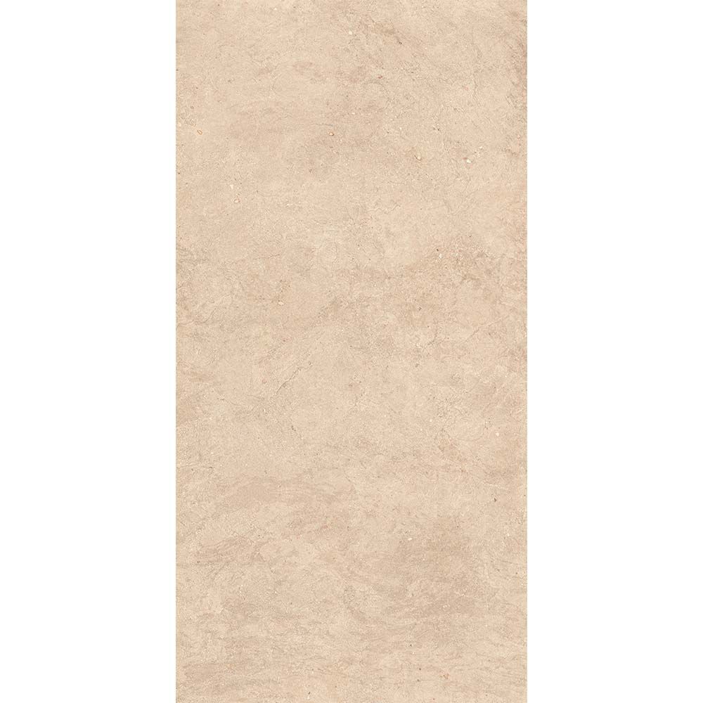 A room setting featuring Canve Sable glazed porcelain tiles on the floor, showcasing the moderate variation and overall aesthetic.