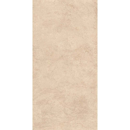 A room setting featuring Canve Sable glazed porcelain tiles on the floor, showcasing the moderate variation and overall aesthetic.
