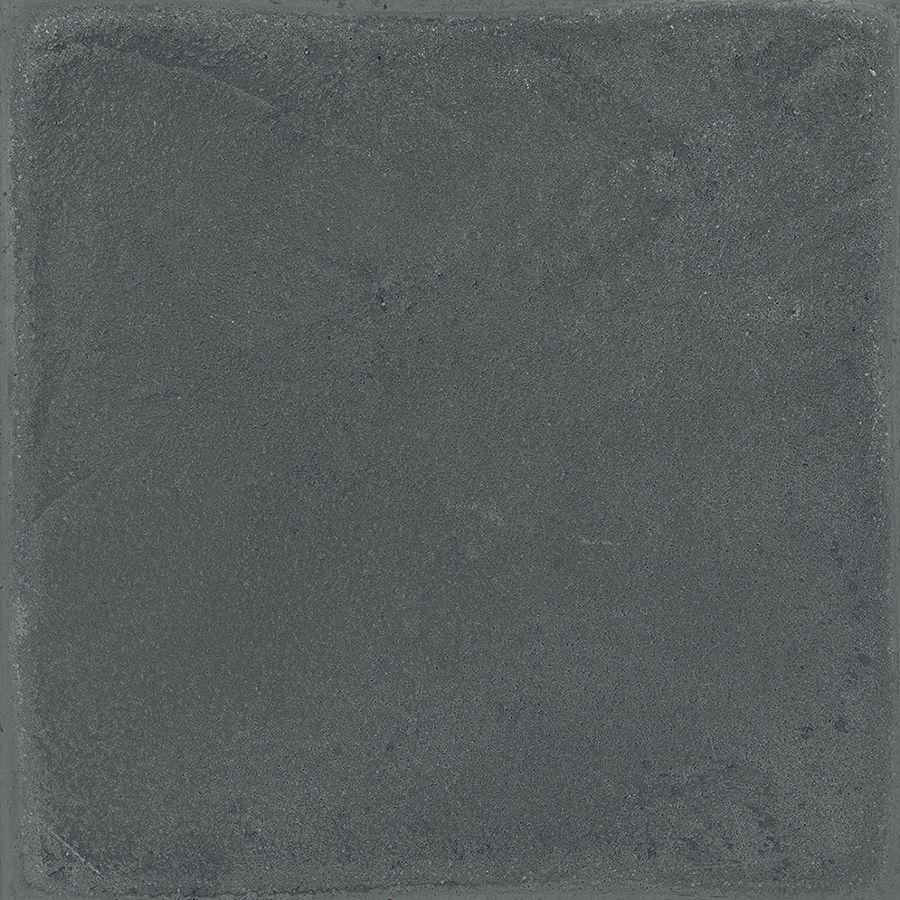 An example of Chalk 8x8 Dark Matte porcelain tiles installed in a modern interior setting, highlighting its concrete aesthetic.