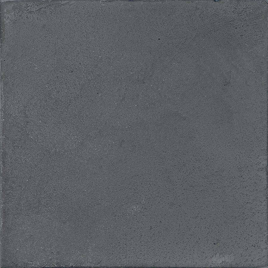 A stack of Chalk 8x8 Dark Matte porcelain tiles, demonstrating the consistent sizing and non-rectified edges.