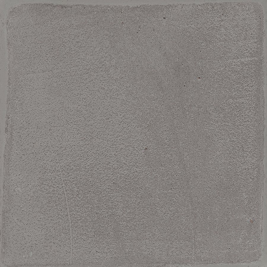 Arrangement of multiple Chalk 8x8 Grey Matte tiles on a surface, highlighting the V2 slight variation.