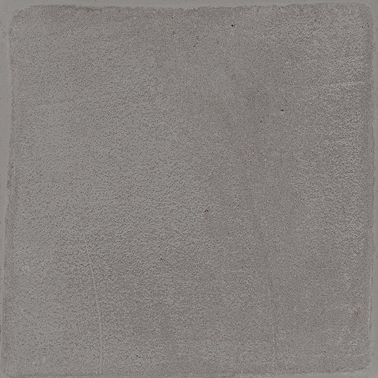Arrangement of multiple Chalk 8x8 Grey Matte tiles on a surface, highlighting the V2 slight variation.