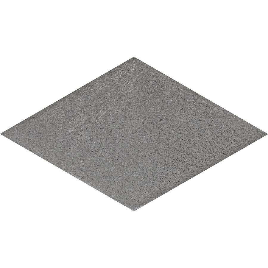 Arrangement of grey rhomboid tiles forming a geometric pattern on a floor or wall.