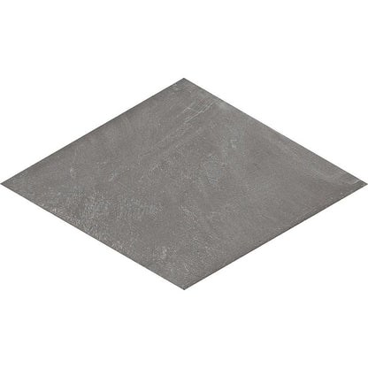 A room featuring the grey rhomboid tiles installed on a floor, showcasing the modern concrete aesthetic.