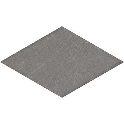 Detail of the rhomboid tile shape and its matte surface, highlighting the non-rectified edge.