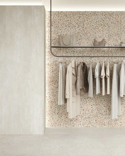 A stack of Civic Multicolour Warm matte porcelain tiles, demonstrating the consistent size and rectified edges.