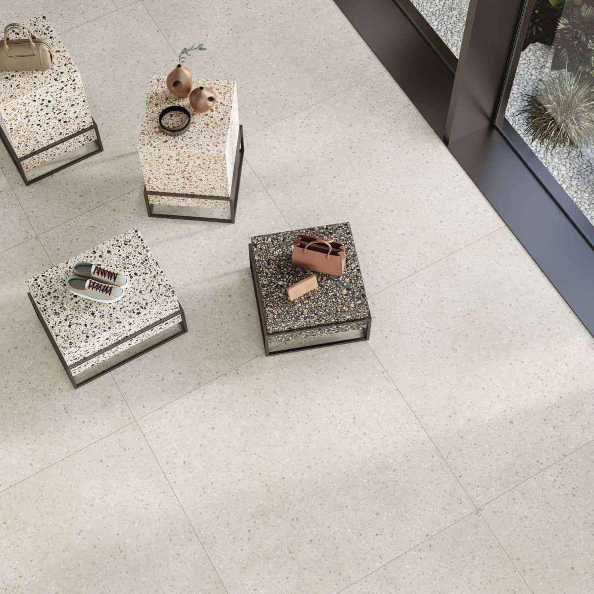 A room scene featuring the Civic Multicolour Cold matte porcelain tiles installed on the floor, showcasing the overall pattern and slight variation.