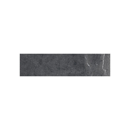 A tiled surface featuring multiple Classica 3x12 Nero Marquina tiles, highlighting the rectified edges and minimal grout lines.