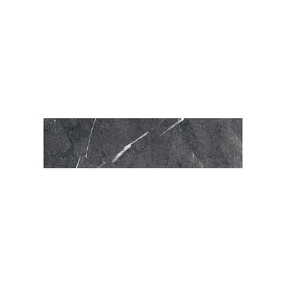 Detail shot of the tile's surface, showing the glazed finish and slight variation in the Nero Marquina pattern.