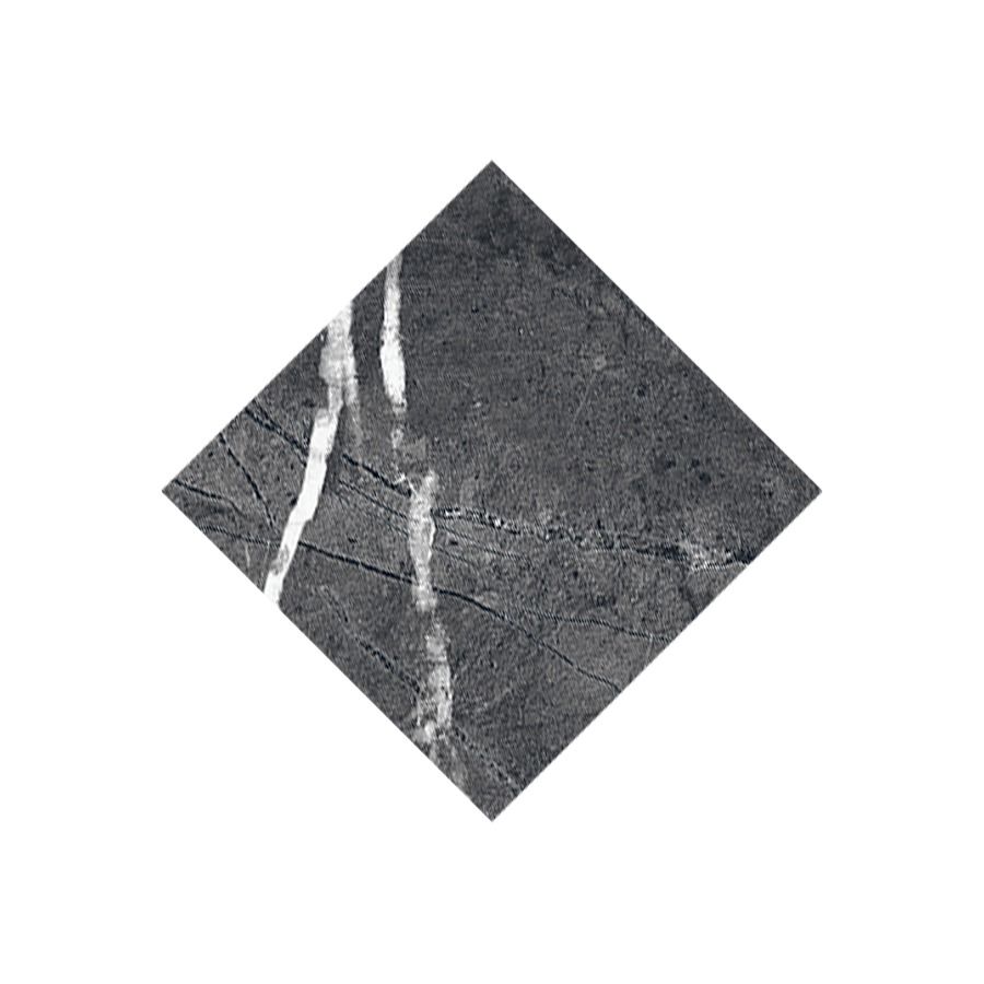 A sample board displaying the Classica Nero Marquina tile alongside other colors and sizes from the Classica collection.