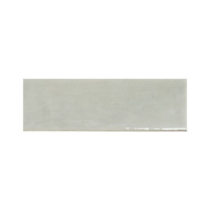 Stack of Agata glossy ceramic wall tiles showing their color and finish