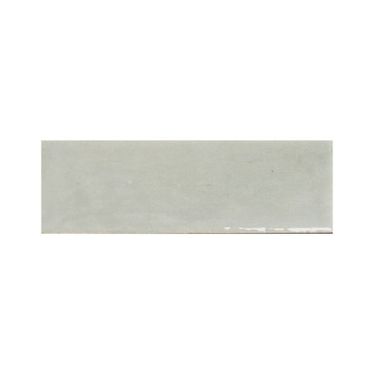 Stack of Agata glossy ceramic wall tiles showing their color and finish