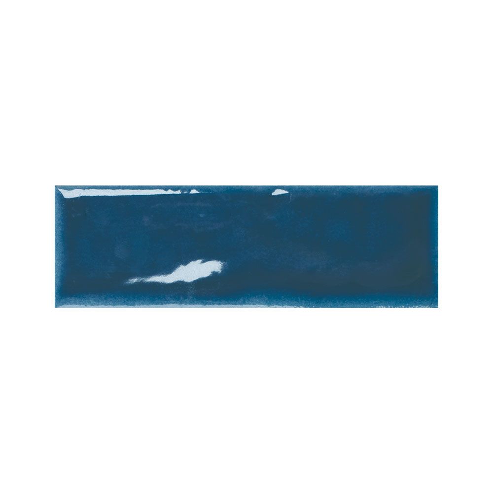 Stack of indigo gloss ceramic tiles showing their reflective surface