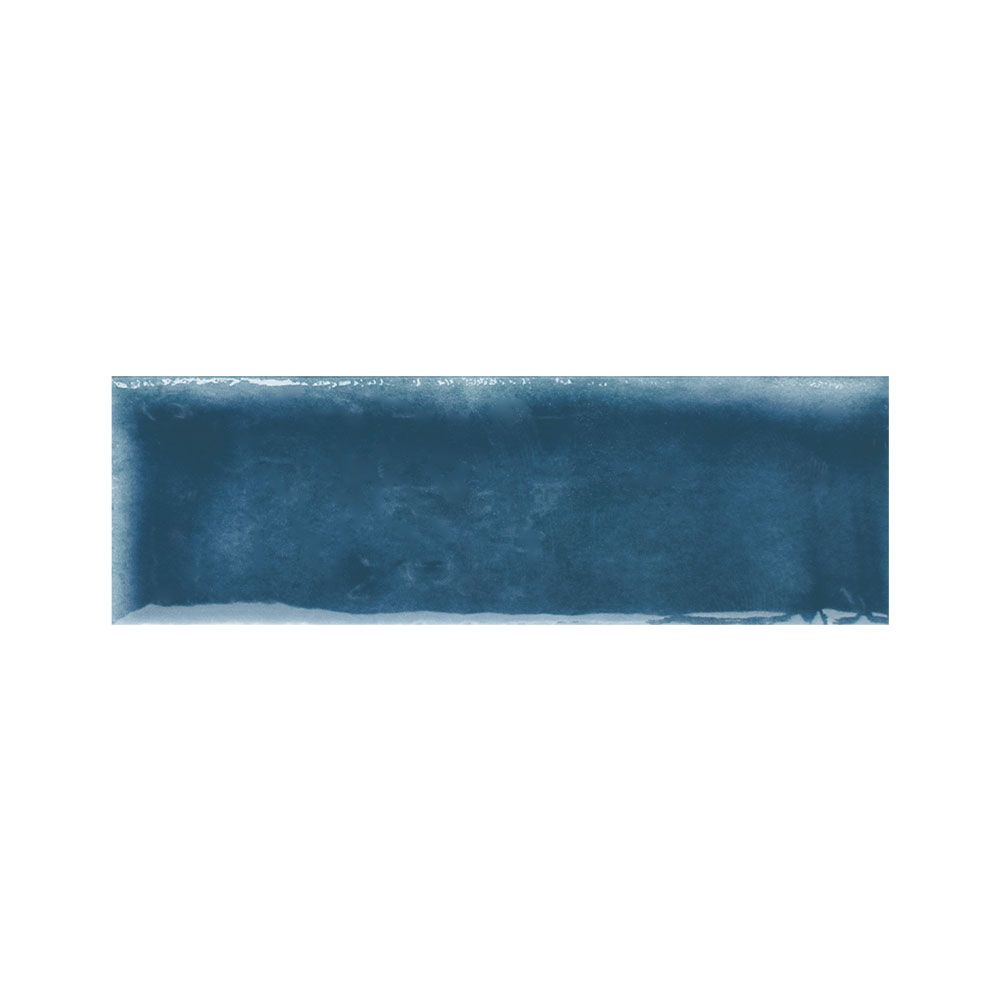 Arrangement of indigo gloss tiles highlighting their moderate variation
