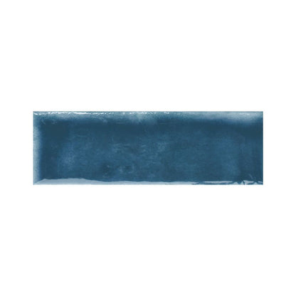 Arrangement of indigo gloss tiles highlighting their moderate variation