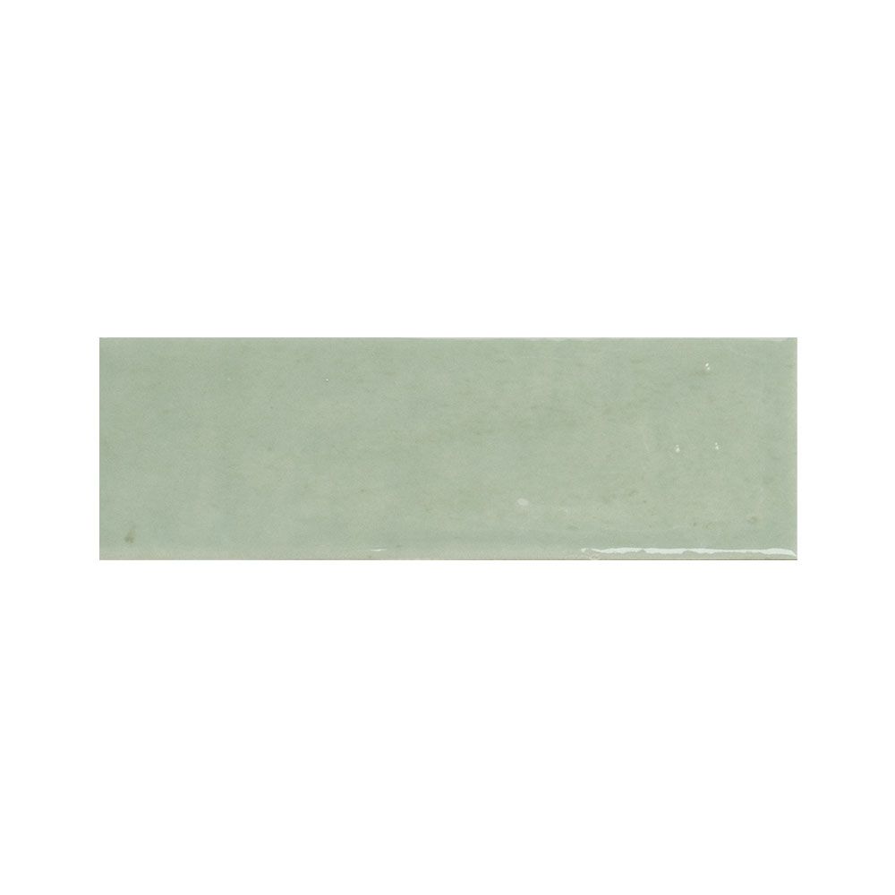Stack of 2x5 inch kiwi green gloss ceramic tiles