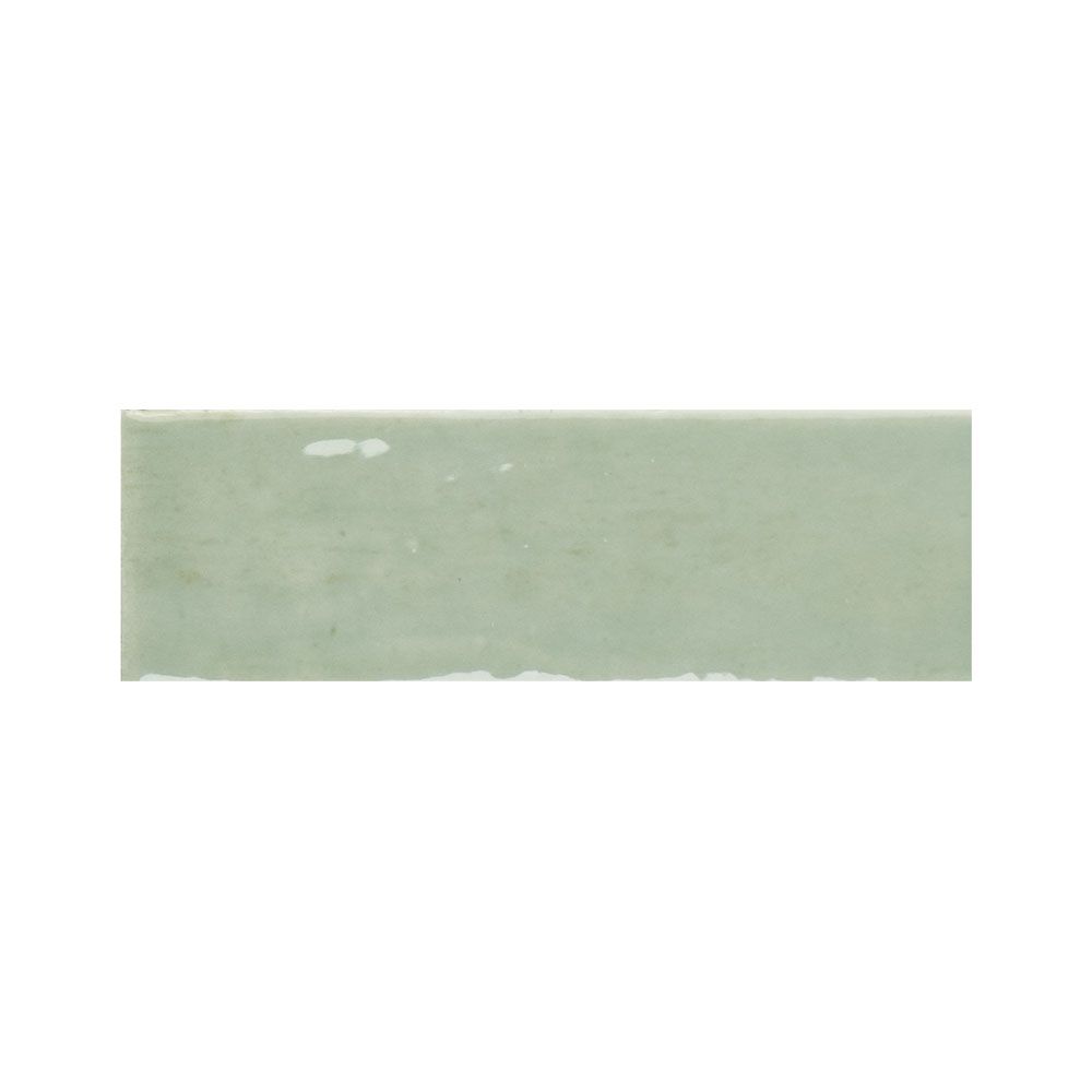 Detail shot of the gloss finish on a kiwi green ceramic tile