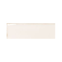 Close-up of a single Ames Tile Colour Notes 2"x5" Oat Gloss ceramic wall tile, showing its smooth, reflective surface.