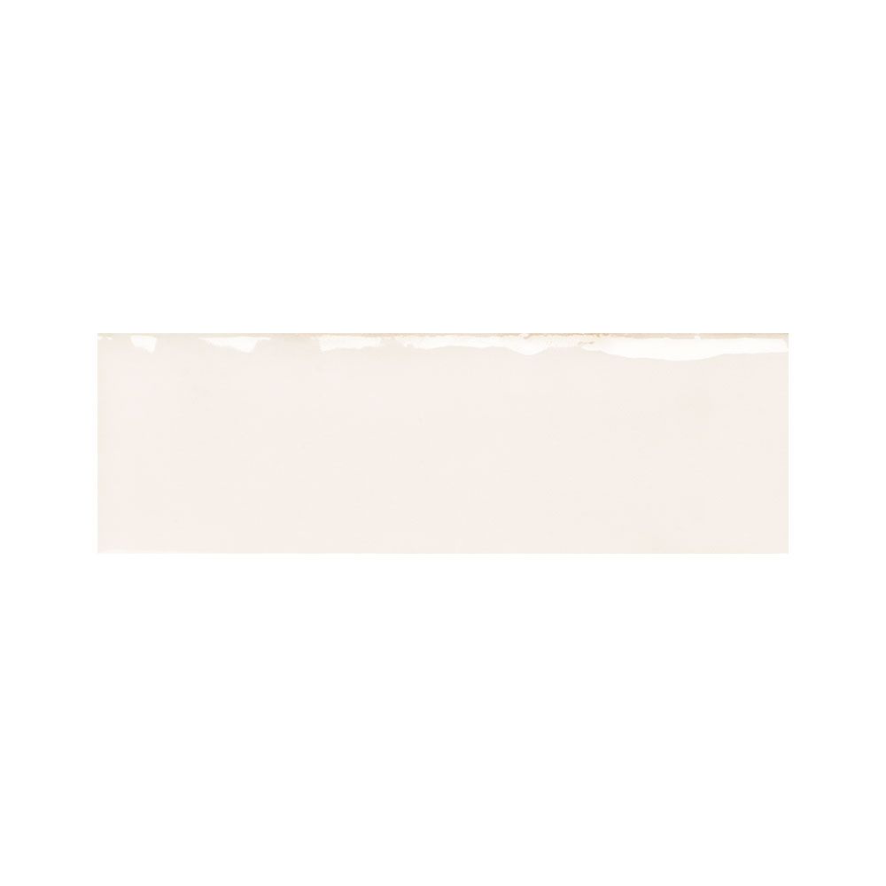 Detail shot of the edge of an Ames Tile Colour Notes 2"x5" Oat Gloss ceramic wall tile, emphasizing the clean cut.
