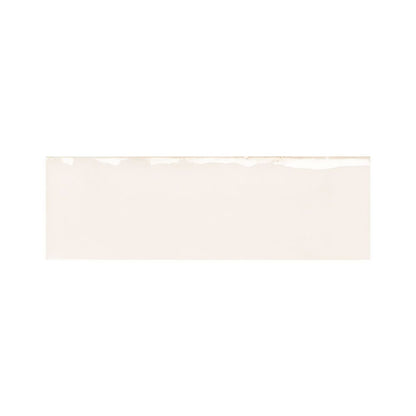 Detail shot of the edge of an Ames Tile Colour Notes 2"x5" Oat Gloss ceramic wall tile, emphasizing the clean cut.
