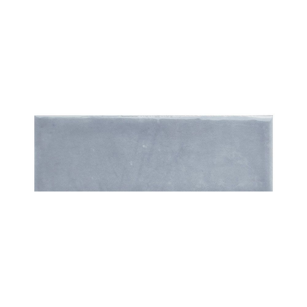 A single Colour Notes 2"x5" Viola Gloss ceramic wall tile with a detailed view of its glossy finish