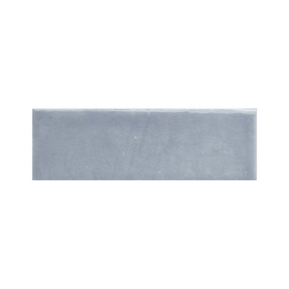 A single Colour Notes 2"x5" Viola Gloss ceramic wall tile with a detailed view of its glossy finish