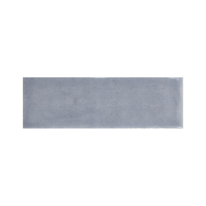 Arrangement of Colour Notes 2"x5" Viola Gloss ceramic wall tiles from a slight angle
