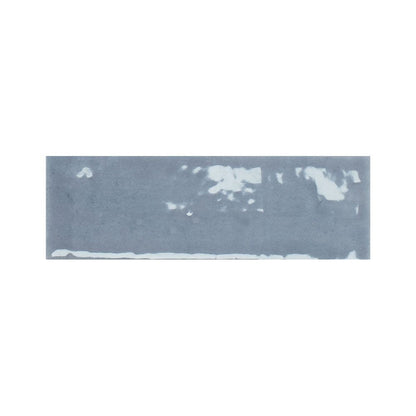 Stack of Colour Notes 2"x5" Viola Gloss ceramic wall tiles showing the glossy surface