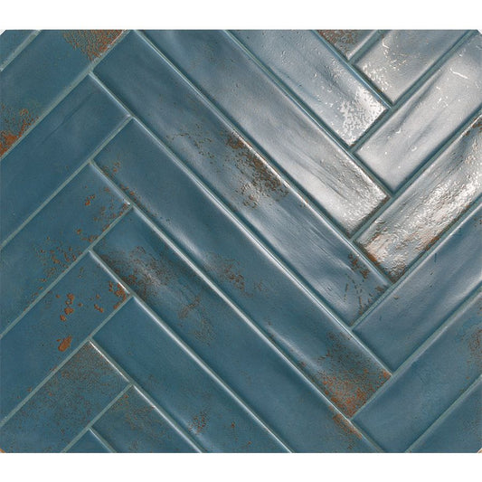 Arrangement of several navy blue ceramic wall tiles, highlighting the 2"x12" size and satin finish in a pattern.