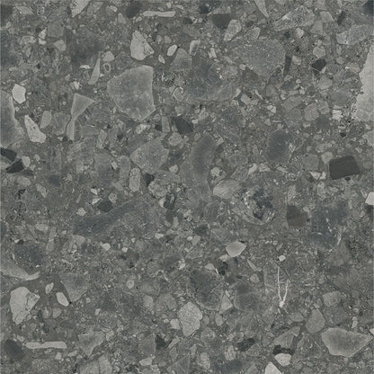 Installation example of Ceppo Anthracite Matte tiles on a floor, showing moderate variation
