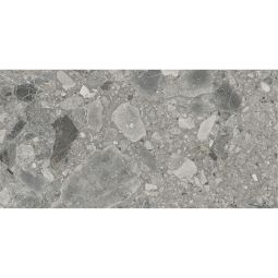 Close-up view of a single Ceppo Grey Matte porcelain tile showing its fragmented mineral design