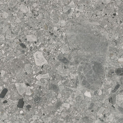Several Ceppo Grey Matte porcelain tiles laid out, showcasing the V3 moderate variation