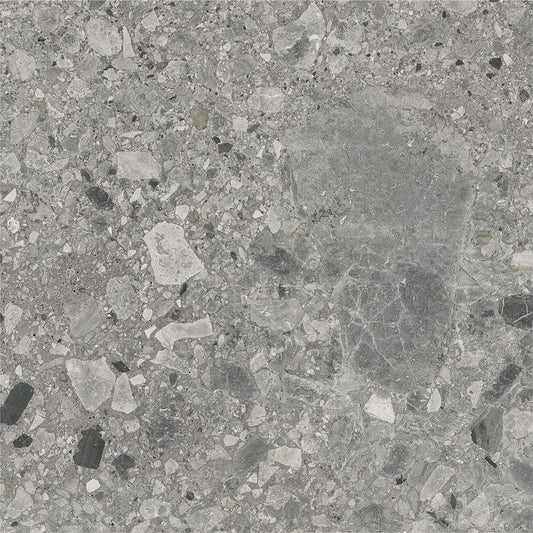 Several Ceppo Grey Matte porcelain tiles laid out, showcasing the V3 moderate variation