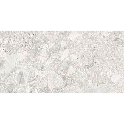 Several Ceppo Ivory Matte porcelain tiles laid out to show the V3 moderate variation in pattern