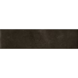 Close-up view of Cera 2x9 Nero Inchiostro matte porcelain wall tiles arranged in a pattern