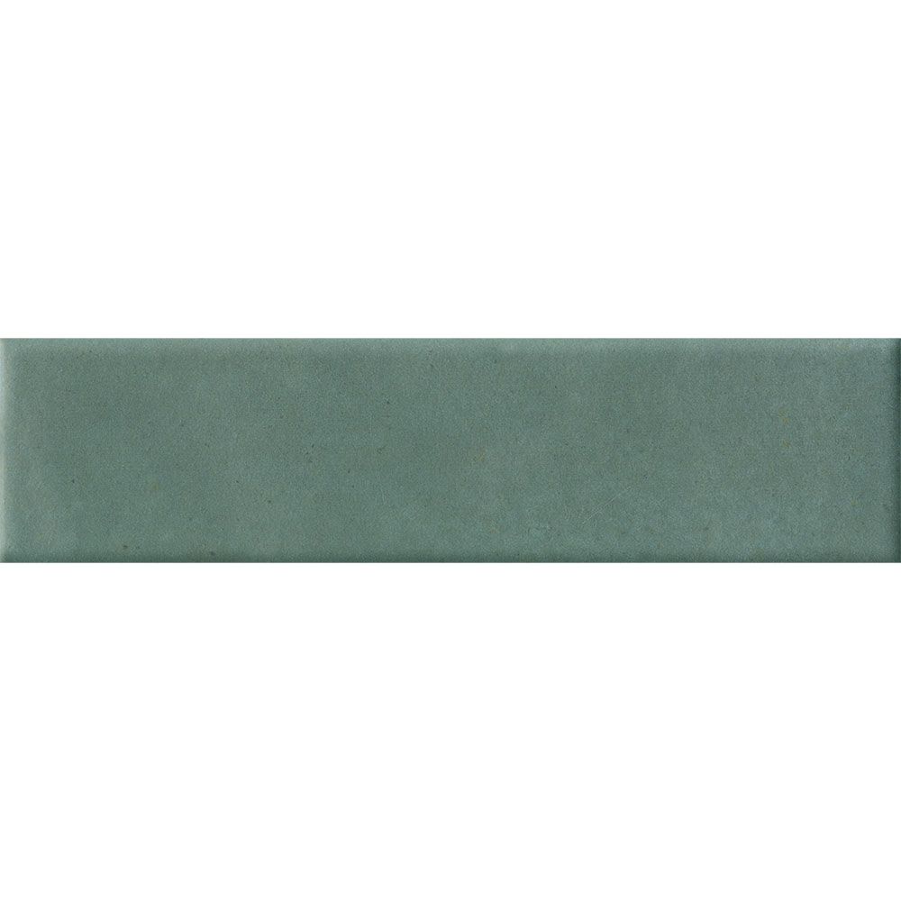 A stack of Cera Verde Foresta Matte porcelain wall tiles, showing the edge and thickness of the product.